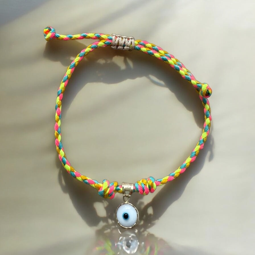 The Protector – 14k Gold Evil Eye Charm on Vibrant Thread