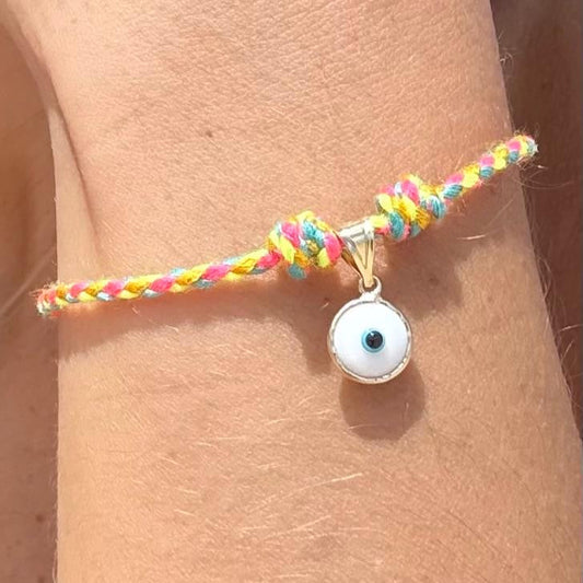 The Protector – 14k Gold Evil Eye Charm on Vibrant Thread