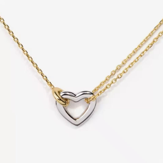 Two-tone heart necklace, gold and silver pendant