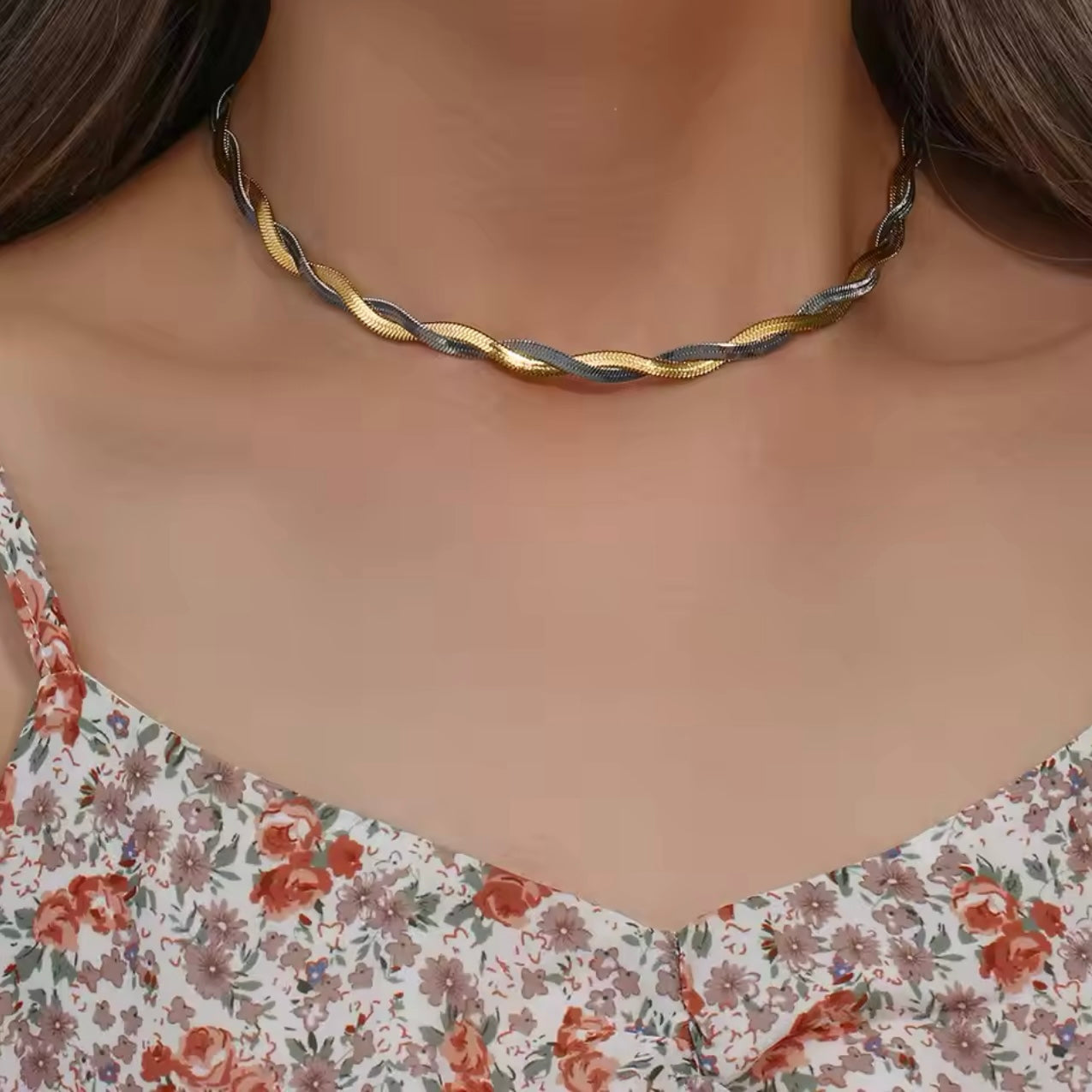 Close-up of braided herringbone necklace design